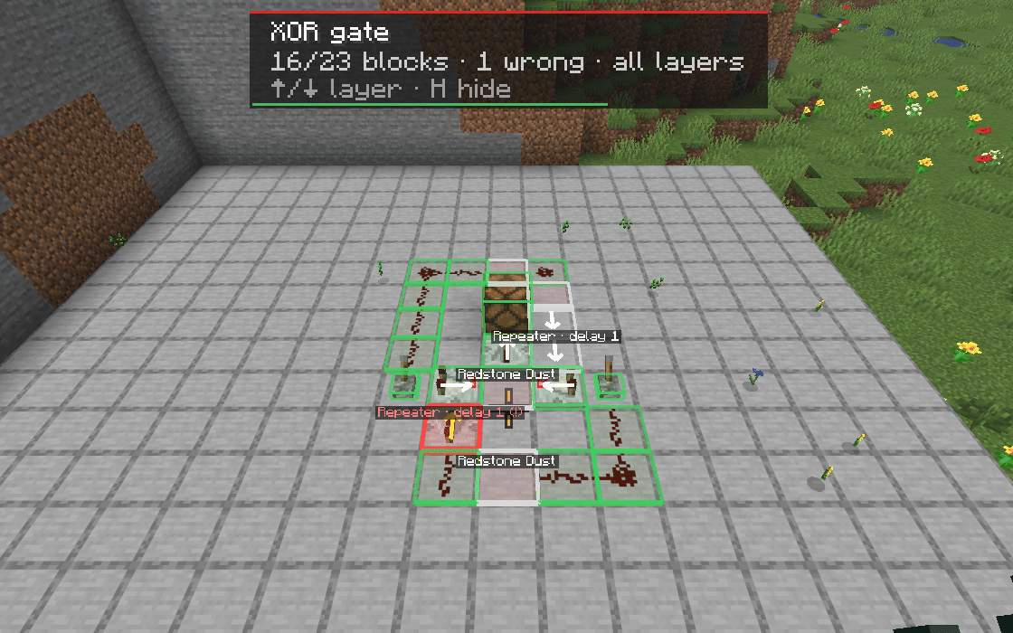 Ghost blocks of a template in the world, green, red and grey